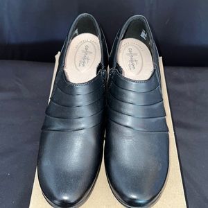 Black leather Clark’s booties